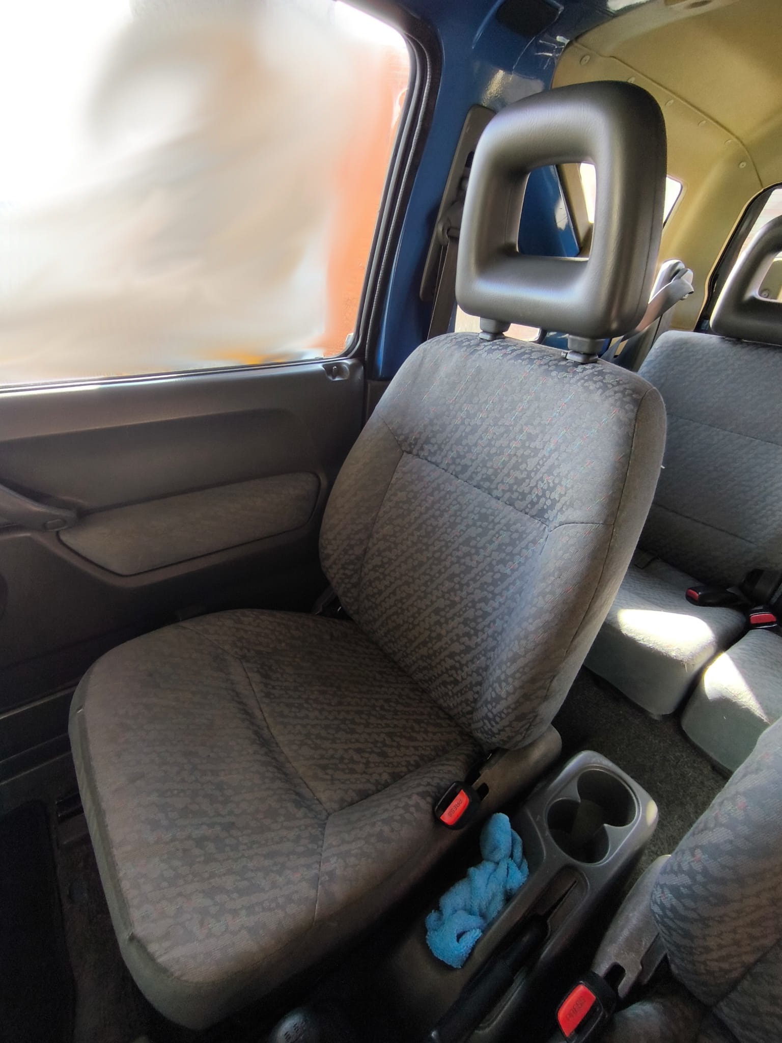 Asiento del acompañante y consola de tracción